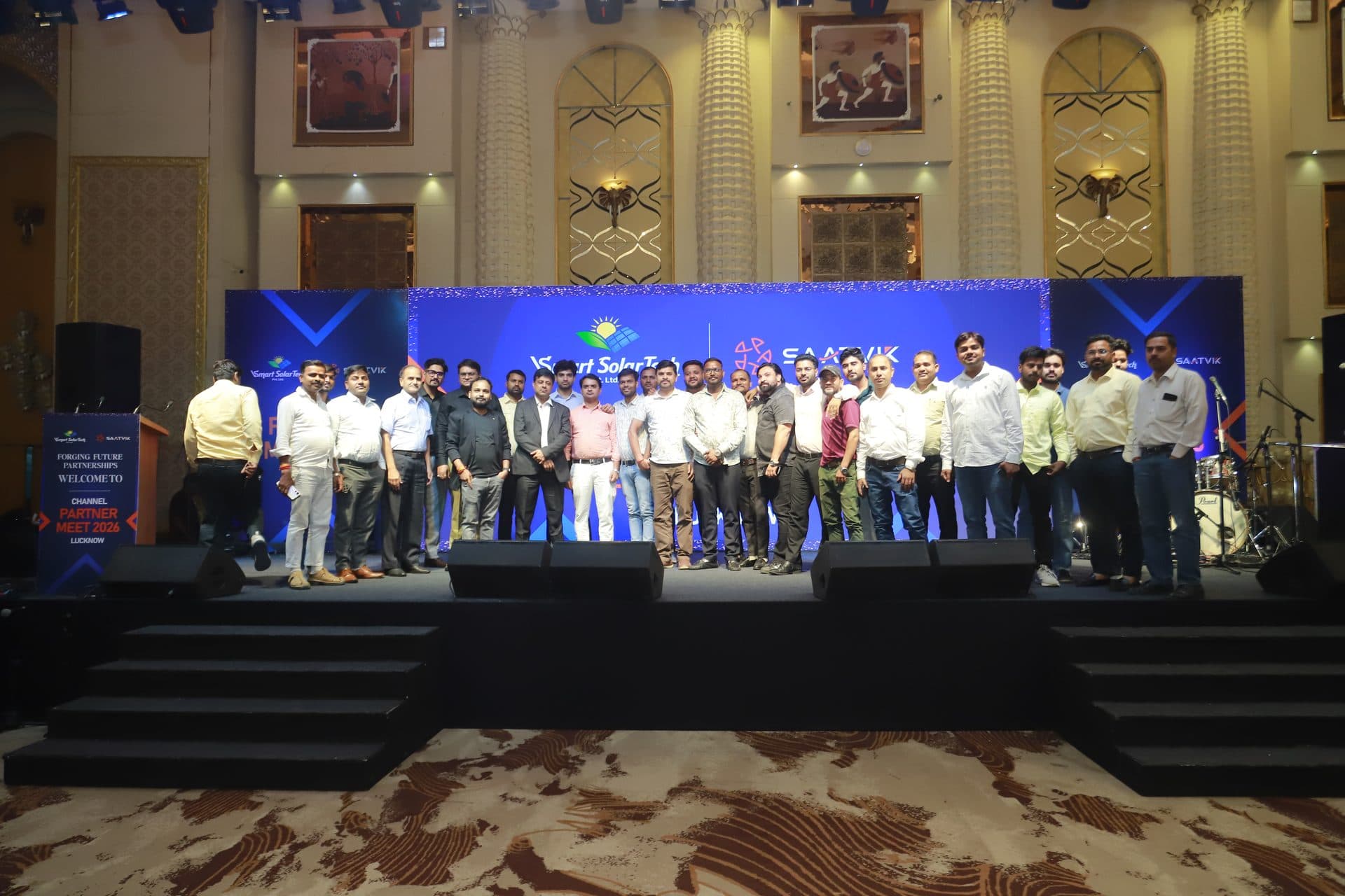Saatvik Solar and VSmart SolarTech Channel Partner Meet 2026 full partner group photo on stage